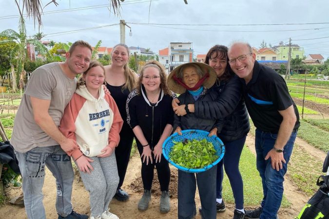 Travellers in Tra Que Village, Hoi An