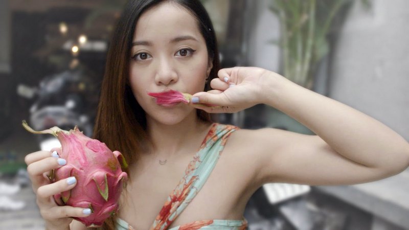Famous YouTube vlogger Michelle Phan tried dragon fruit on her way to Vietnam