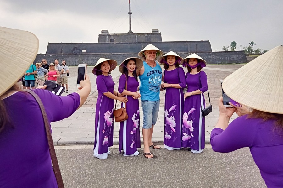 Ao Dai Hue with the special purple color
