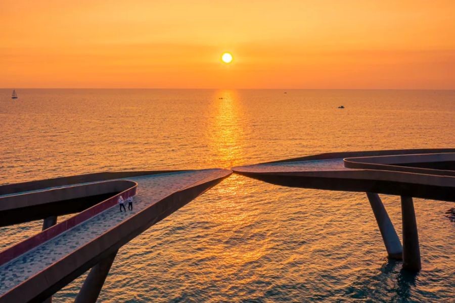 A romantic sunset moment at the Kiss Bridge, Phu Quoc