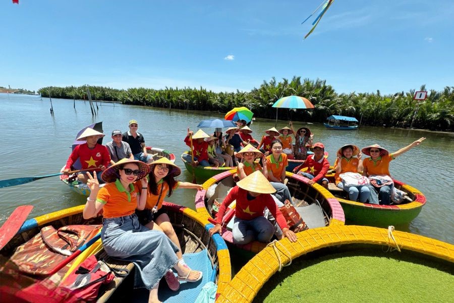 Basket boat trip through Cam Thanh’s coconut forest.