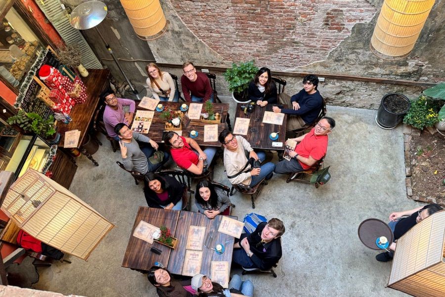 Eviva Tour Vietnam’s travelers sharing a Vietnamese coffee moment